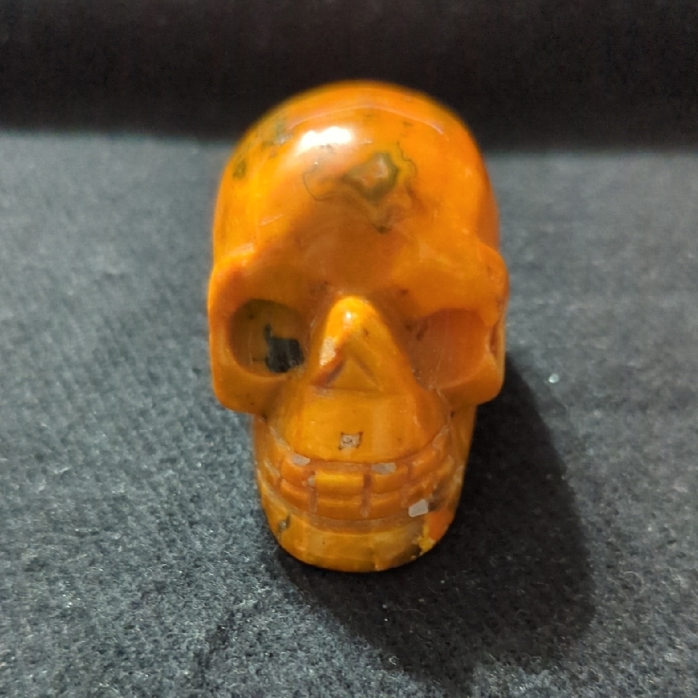 Orange And Black Bumblebee Jasper Gemstone Carved Skull Figurine - 100 Grams